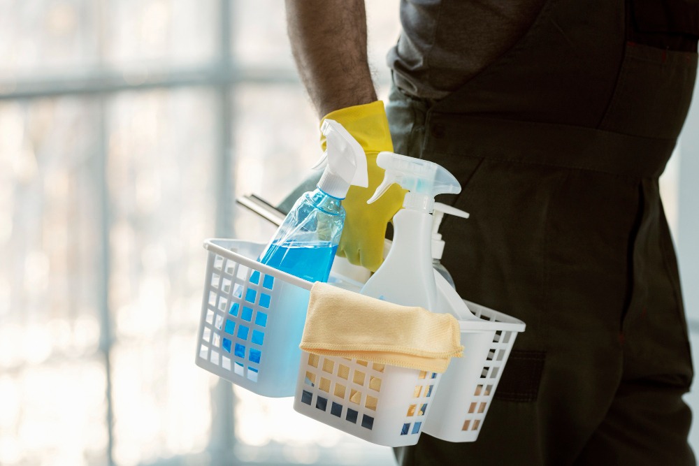 Corporate office cleaning team maintaining executive boardroom with premium cleaning equipment and professional presentation